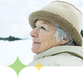 Older woman caregiver take a break in the snow